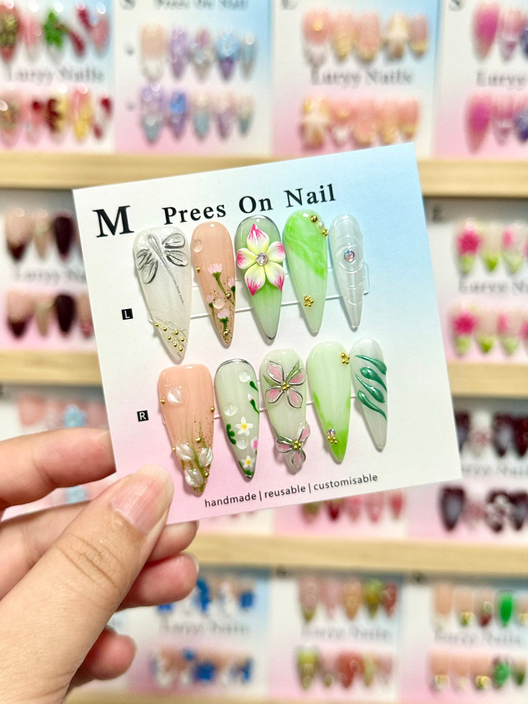Artistic Press-On Nail Set with Floral and Green Accents