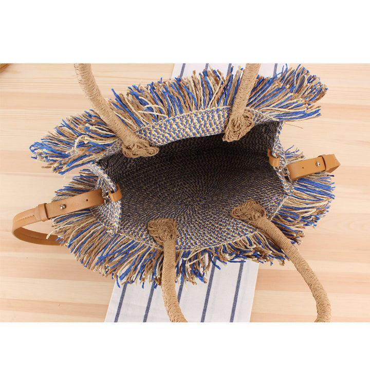Round Bast shoulder bag with fringes and leather handles Kalsten