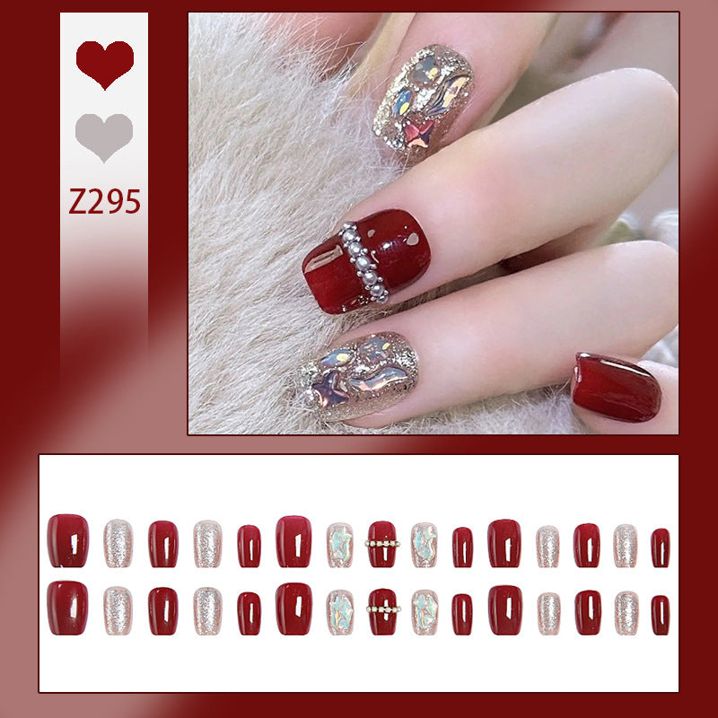 Glamorous artificial nail set with sparkling 3D applications and elegant embellishments Kalsten