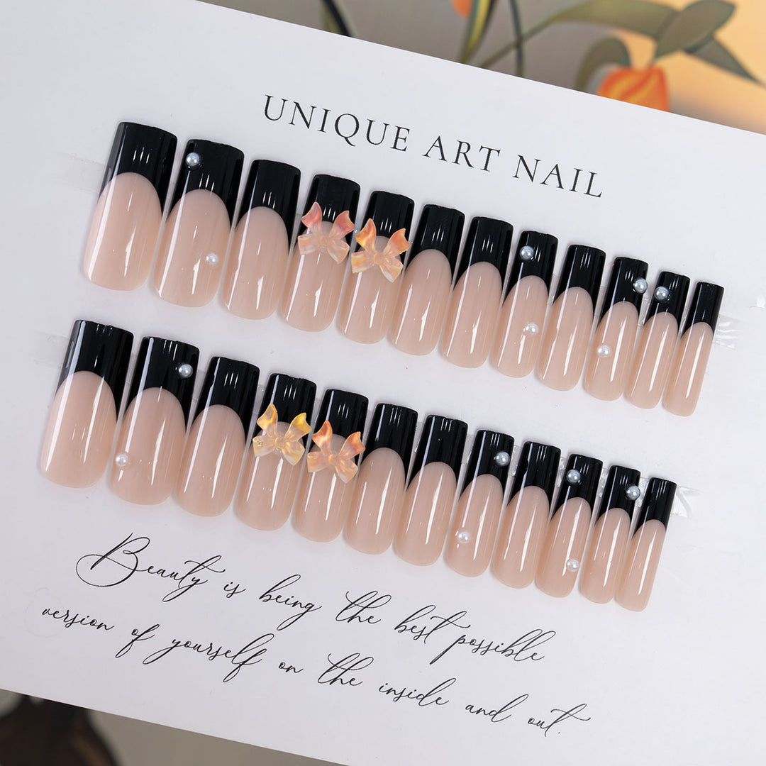 Decorative Press-On Nail Art with Elegant Bow Accents