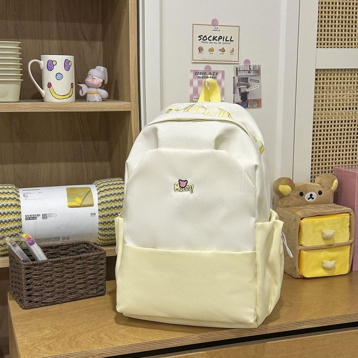 Playful backpack with embroidered Kalsten motif