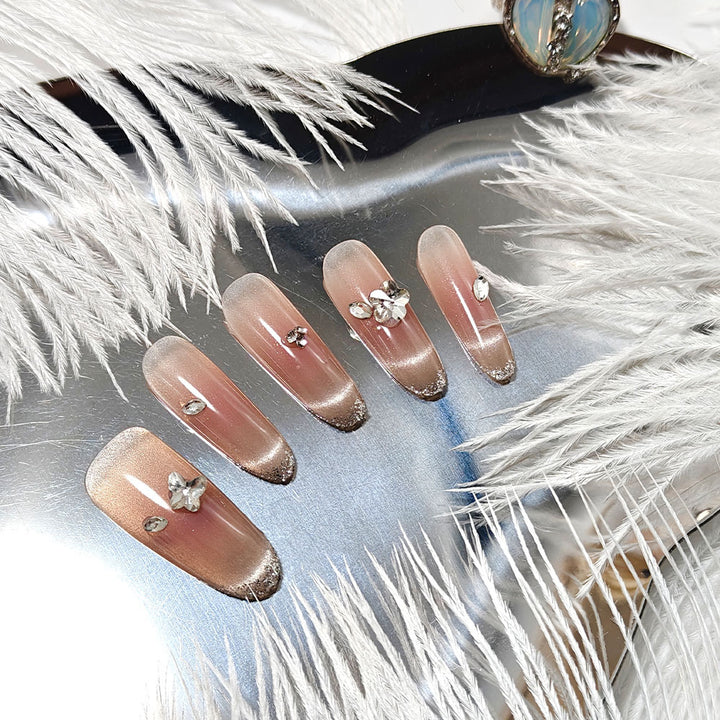 Glamorous artificial nails with rhinestone decorations Kalsten