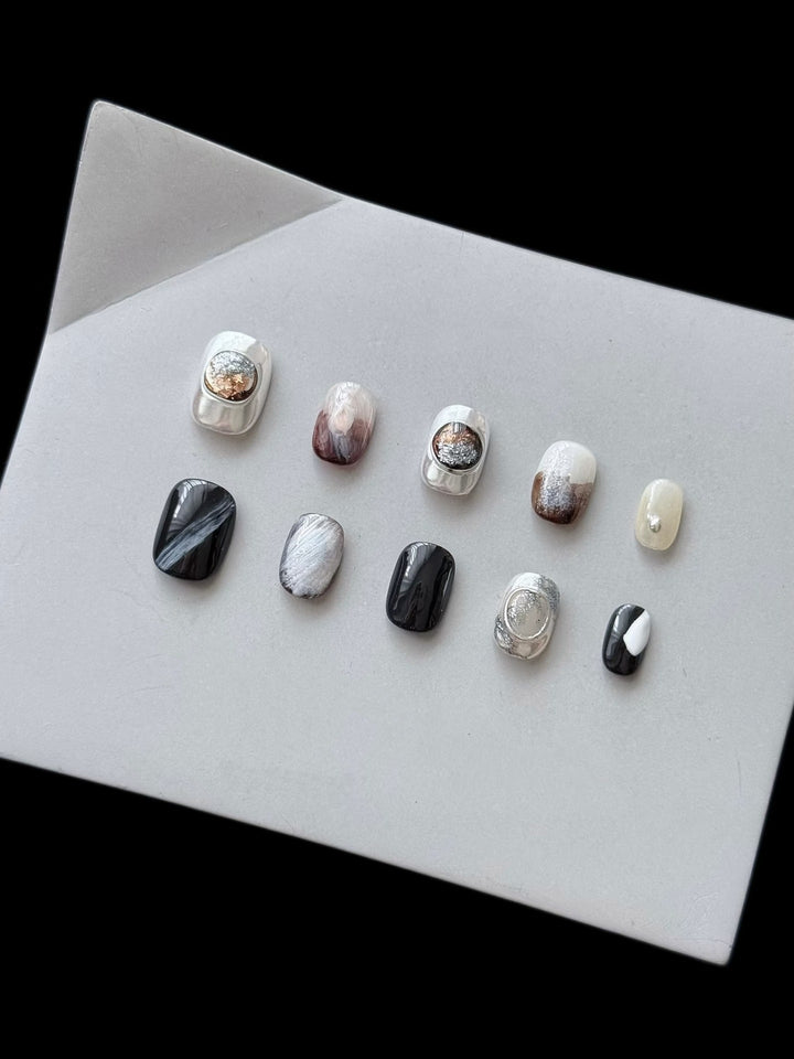 Artistic Press-On Nail Set with Elegant Designs