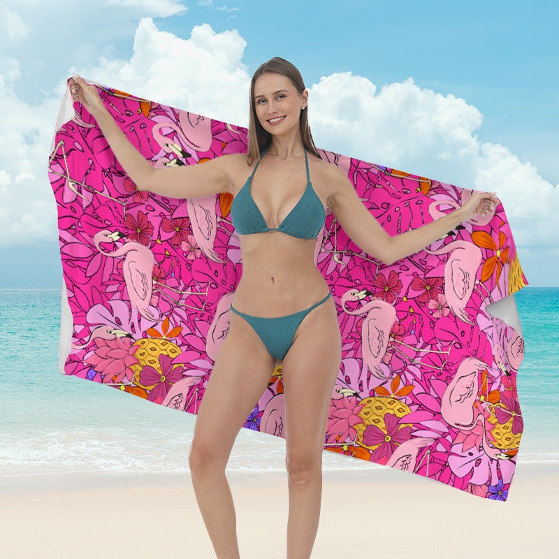 Beach towel with vibrant tropical plant motif Kalsten