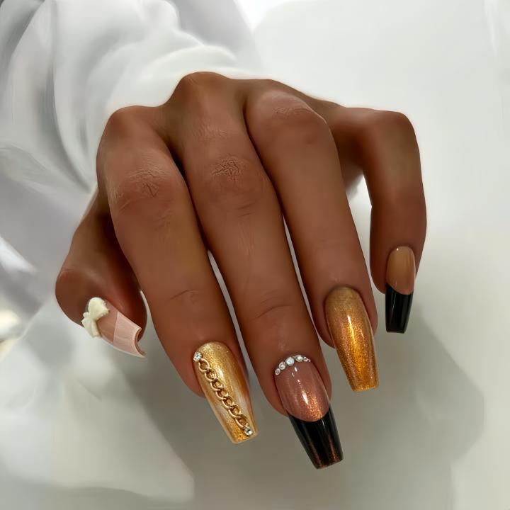 Glamorous artificial nails with glittering design and elegant embellishments Kalsten