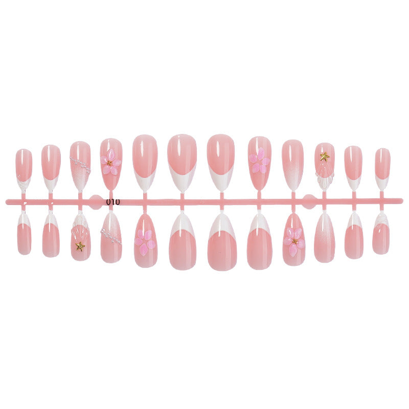 Artificial nail set with elegant floral and glitter accents Kalsten