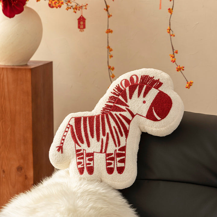 Shaped children's room decorative pillow made of teddy fleece with embroidered zebra motif and contoured silhouette