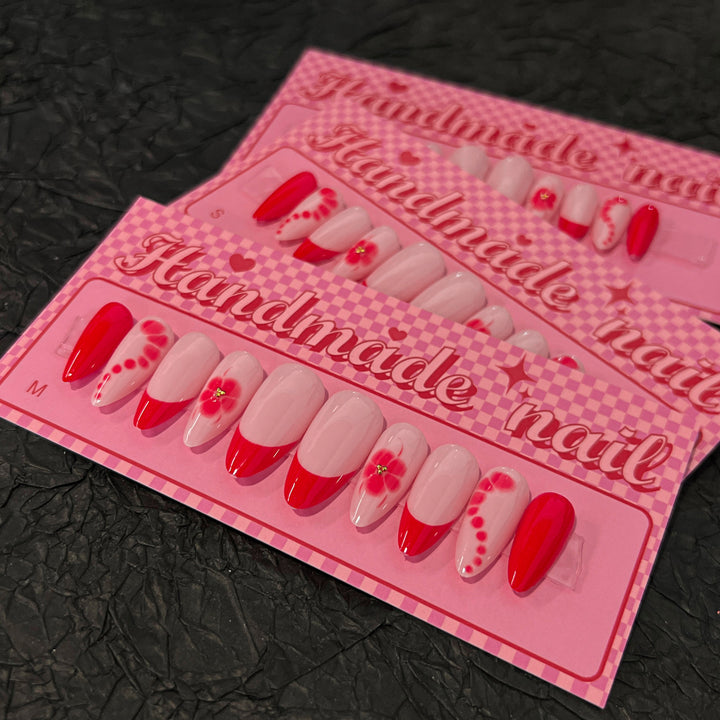 Artistic acrylic nails with floral design and trendy colors Kalsten