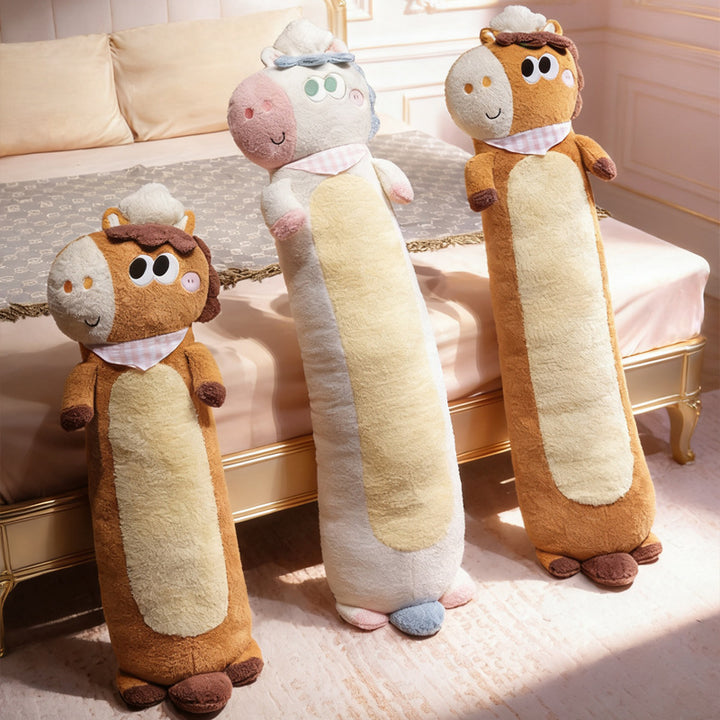Oversized plush body pillow in cow design with supportive filling and removable cover