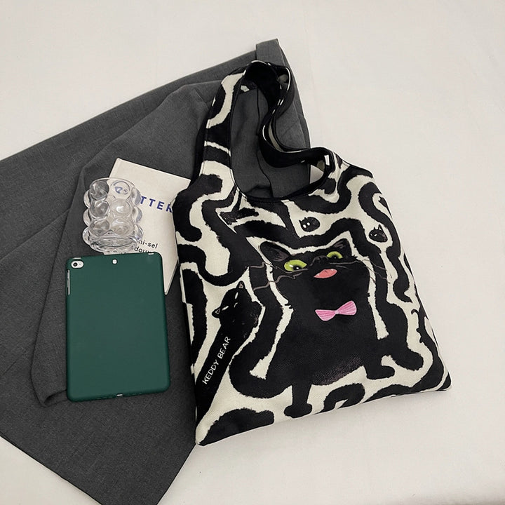 Shoulder bag with playful cat motif Kalsten