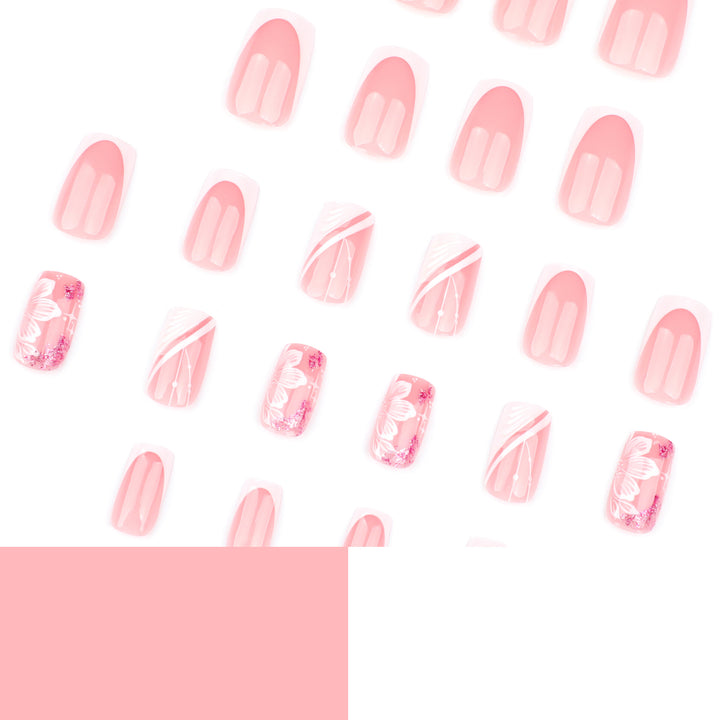 Artful Nail Art with Elegant French Tips and Floral Accents Kalsten