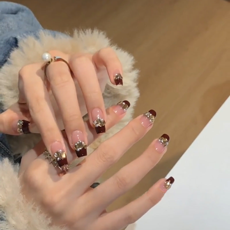 Artful nail extensions with glitter and jewelry embellishments Kalsten