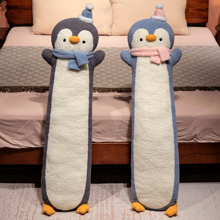 Oversized ergonomic plush body pillow in penguin design with soft hollow fiber filling
