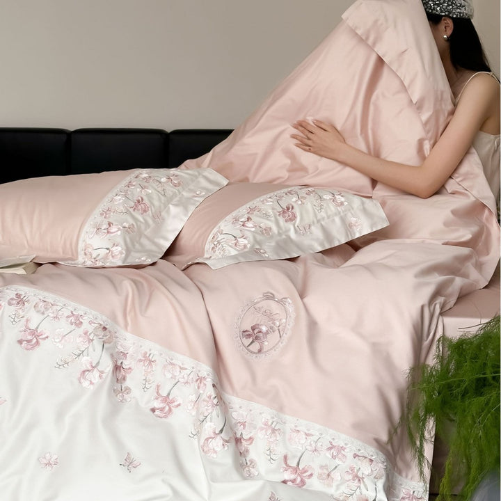 Luxurious satin bedding set with floral stitched border