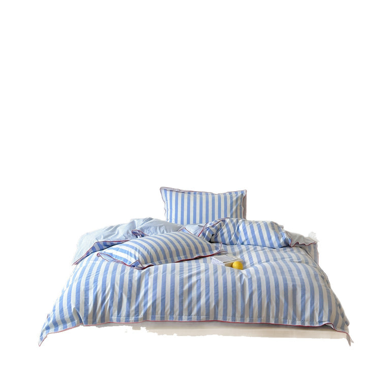 Striped duvet cover and pillowcase set with contrast piping