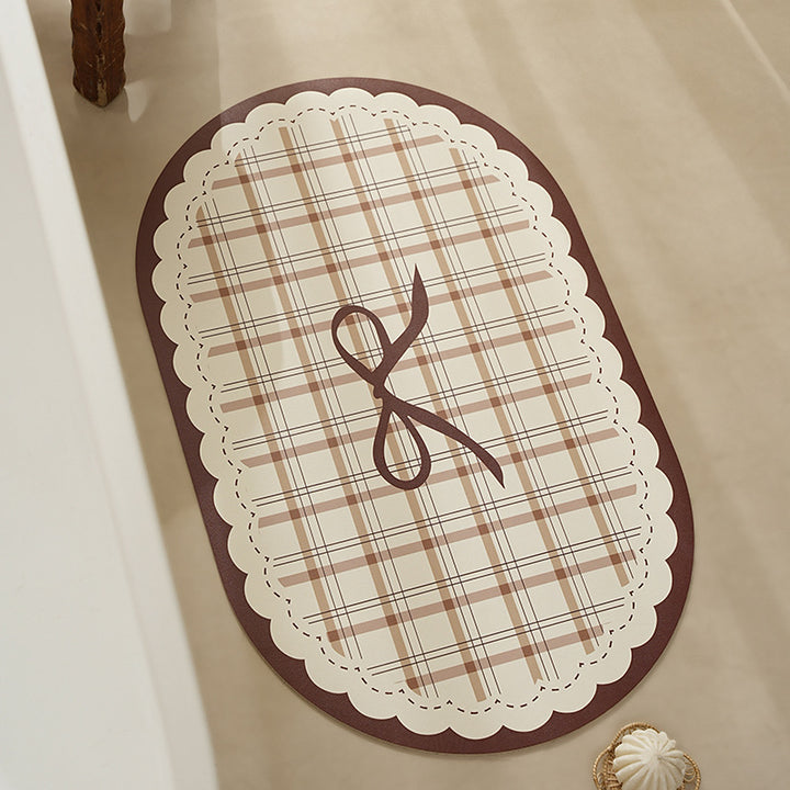 Rectangular table set placemat made of coated cotton mix with check pattern, decorative edge and bow motif