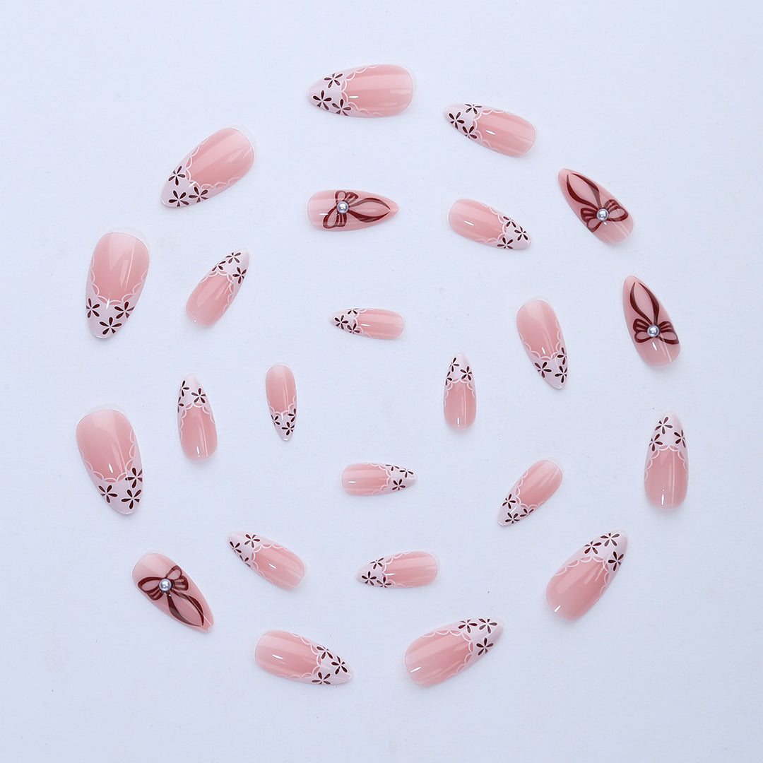 Elegant artificial nail design with floral accents Kalsten