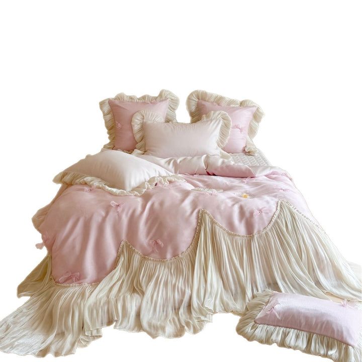 Luxurious satin bedding set with ruffles, pleated bed skirt and decorative pillow