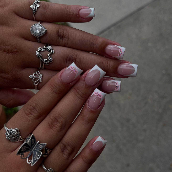 Elegant French Tip Nail Art Set with Delicate Bow Accents