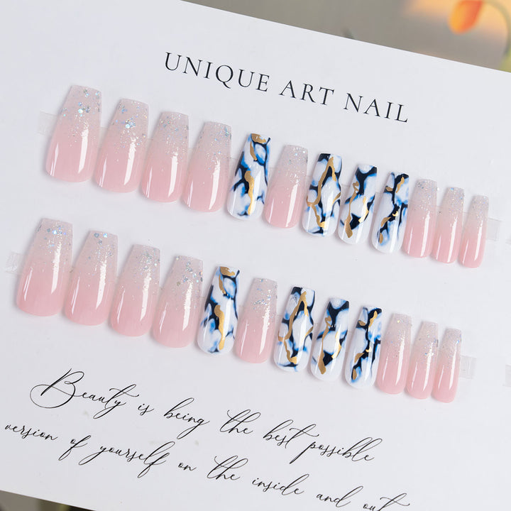 Long-Stiletto Abstract Nail Enhancements