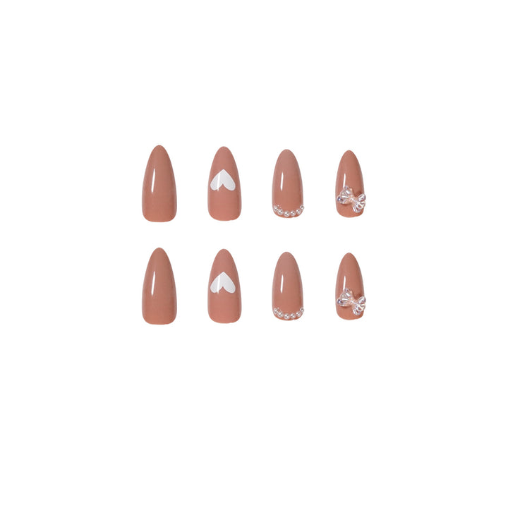 Elegant artificial nails with heart-shaped and glitter accents Kalsten