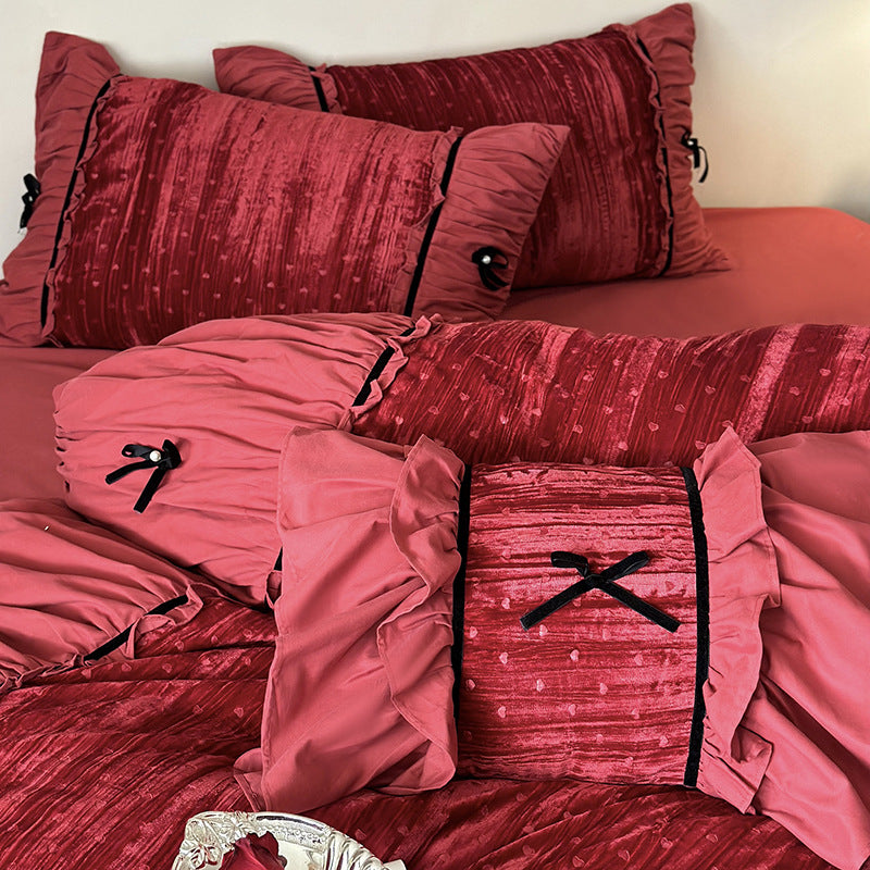 Bedding set made of velvety microfiber with ruffles, decorative ribbons, and quilted texture
