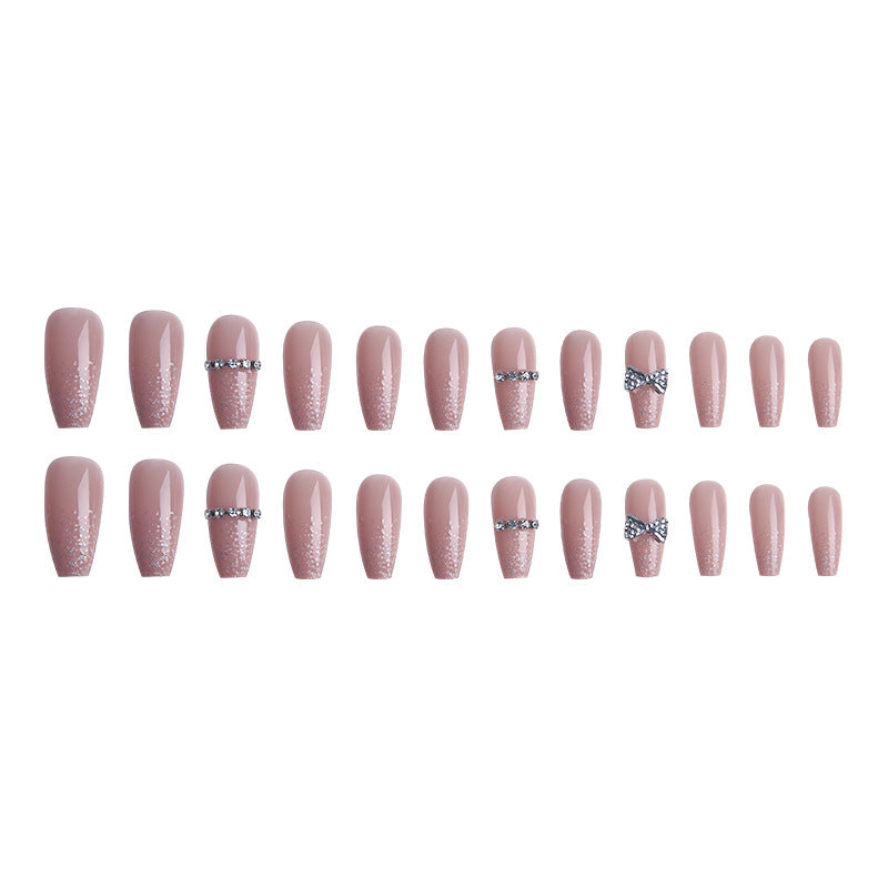 Glamorous artificial nails with sparkling rhinestone and glitter elements Kalsten