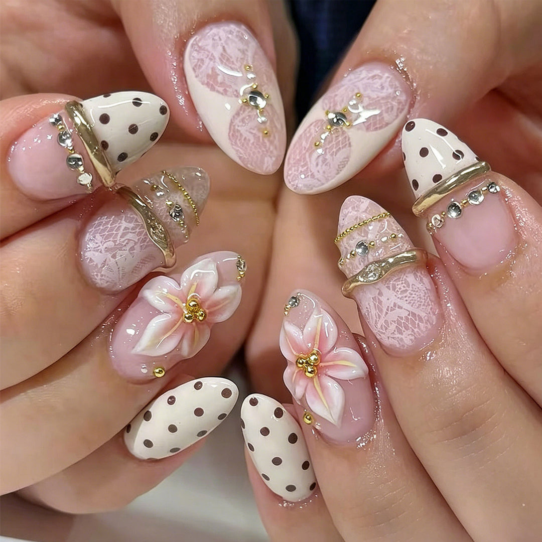Artful Nail Extensions with Elegant Floral and Glitter Accents Kalsten