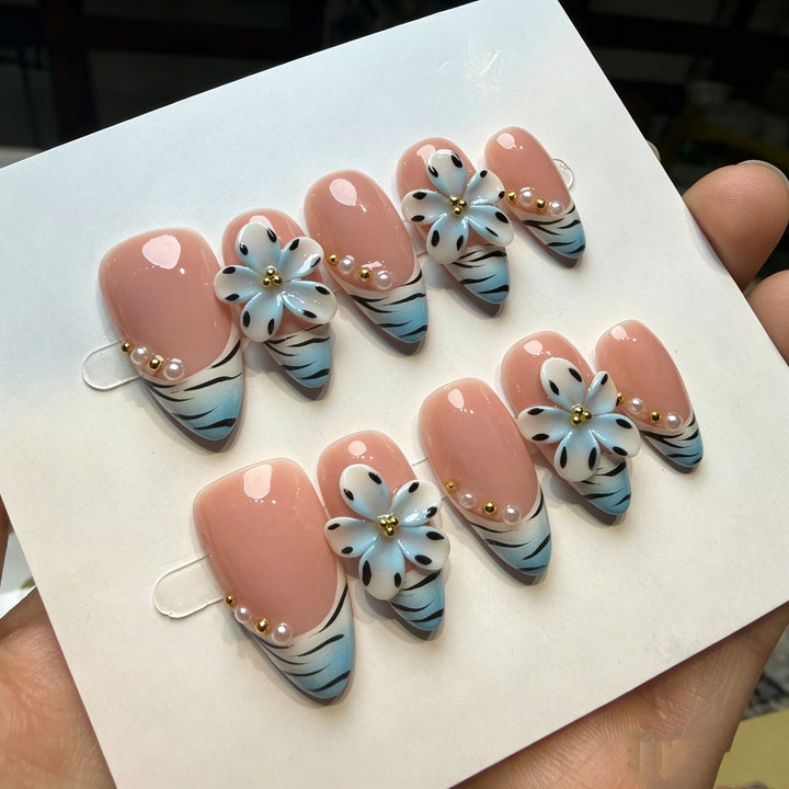 Artistic Press-On Nail Set with Floral and Green Accents