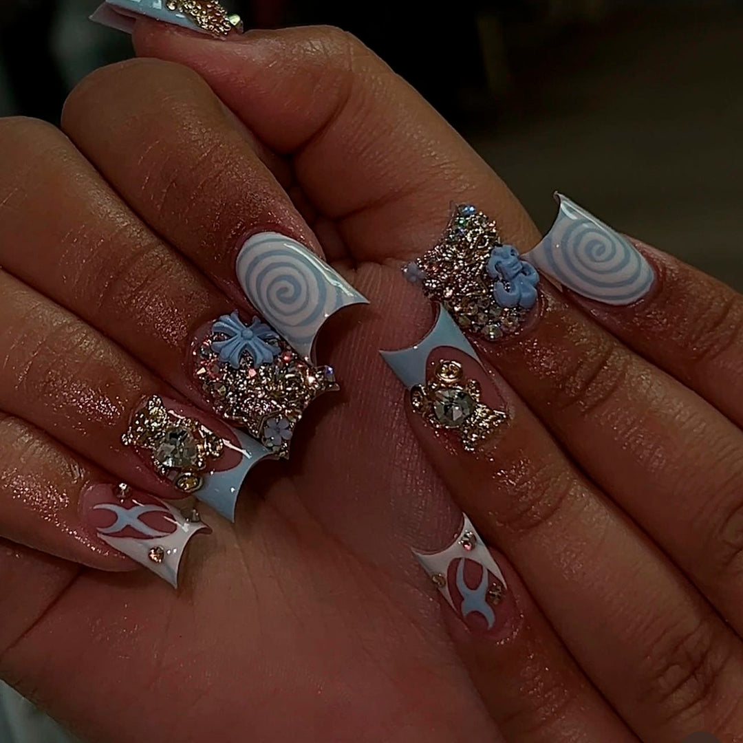 Artful nail art with cute animal motifs and glitter accents Kalsten