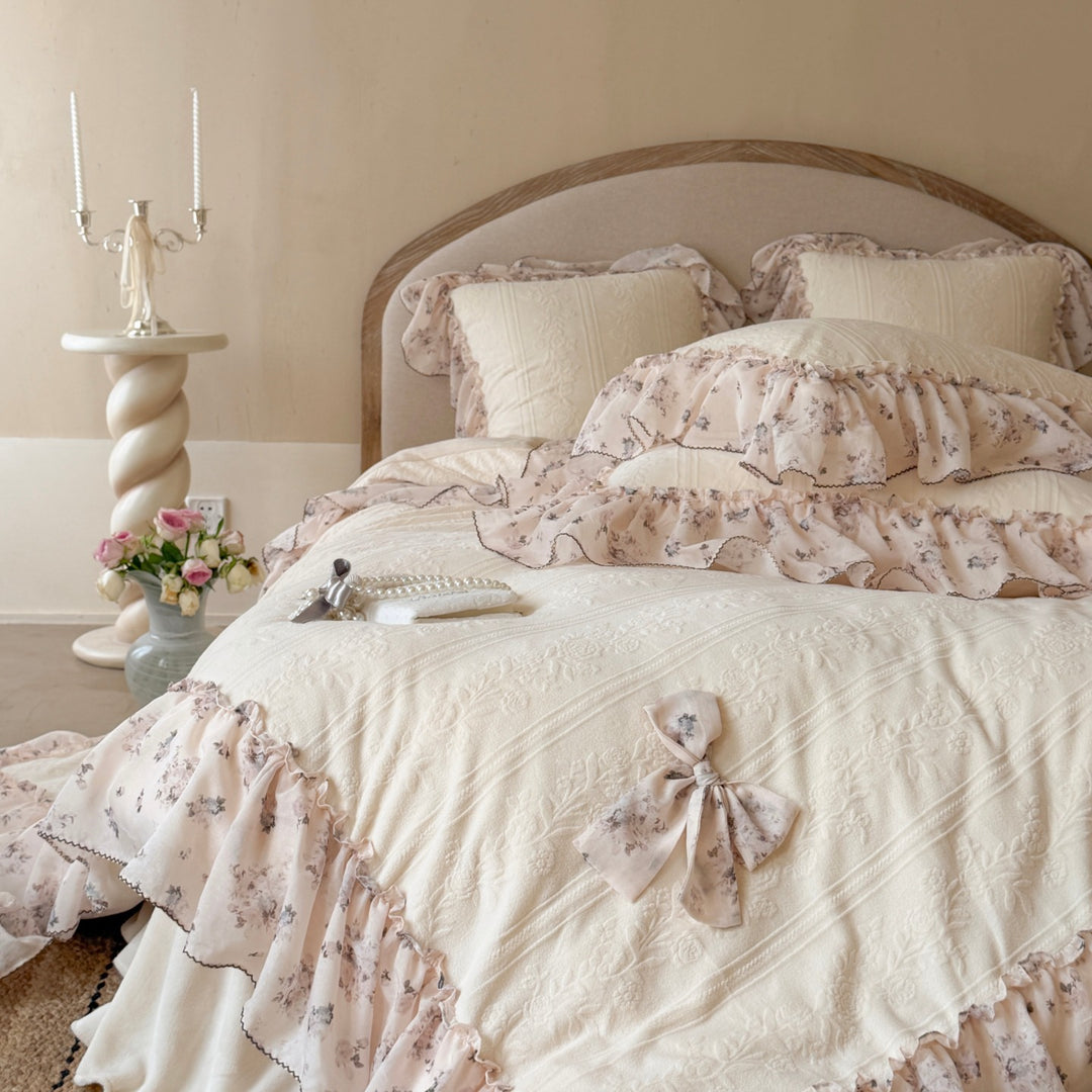 Romantic cotton bedding set with jacquard structure, ruffles and bow trim