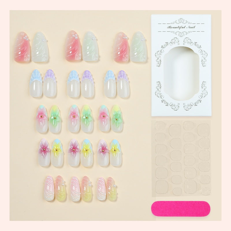 Nail set with colorful floral design and glitter accents Kalsten