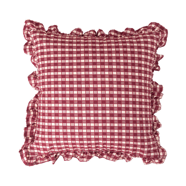Decorative cushion with gingham pattern and playful ruffled edge