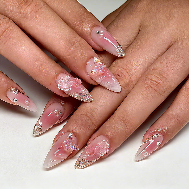 Artificial nail creation with floral 3D details and glitter accents Kalsten