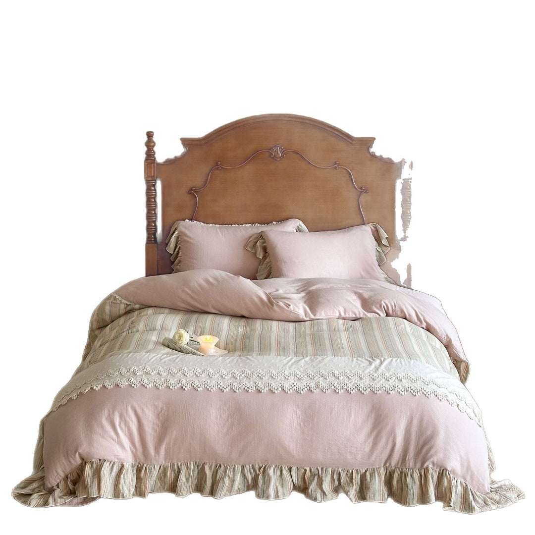 Multi-piece cotton satin bedding set with lace trim and striped ruffled bed skirt