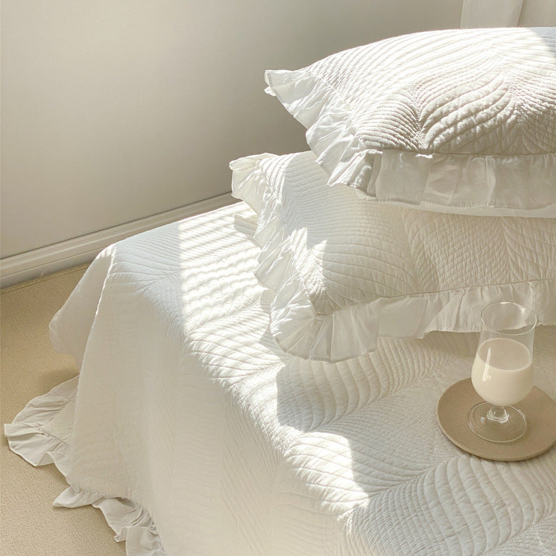 Quilted bedspread set with ruffle and embossed leaf quilting