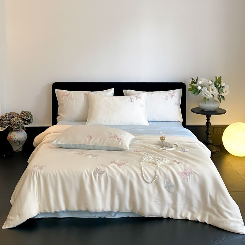Elegant satin bedding set with embroidered butterfly details
