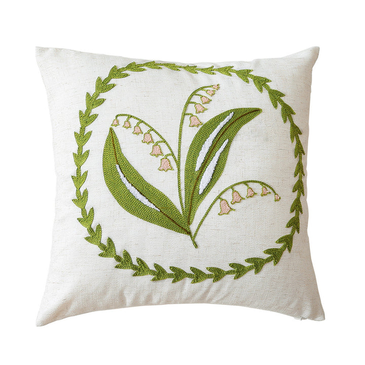 Square bouclé decorative cushion with tufted flower appliqué