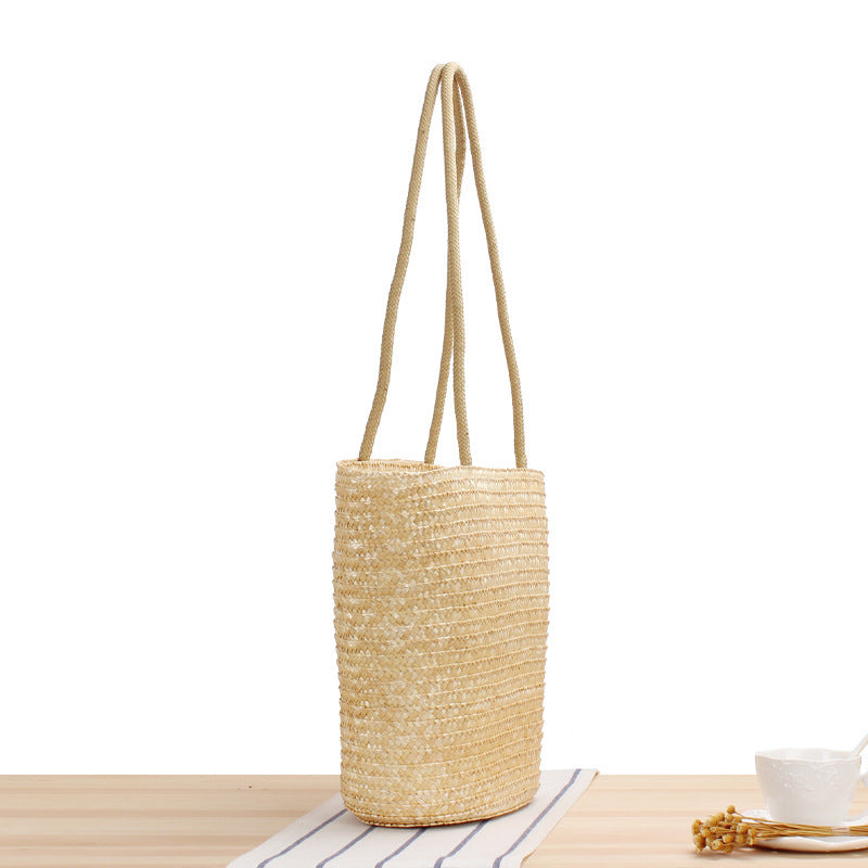 Shoulder bag made of braided natural material with long shoulder straps Kalsten