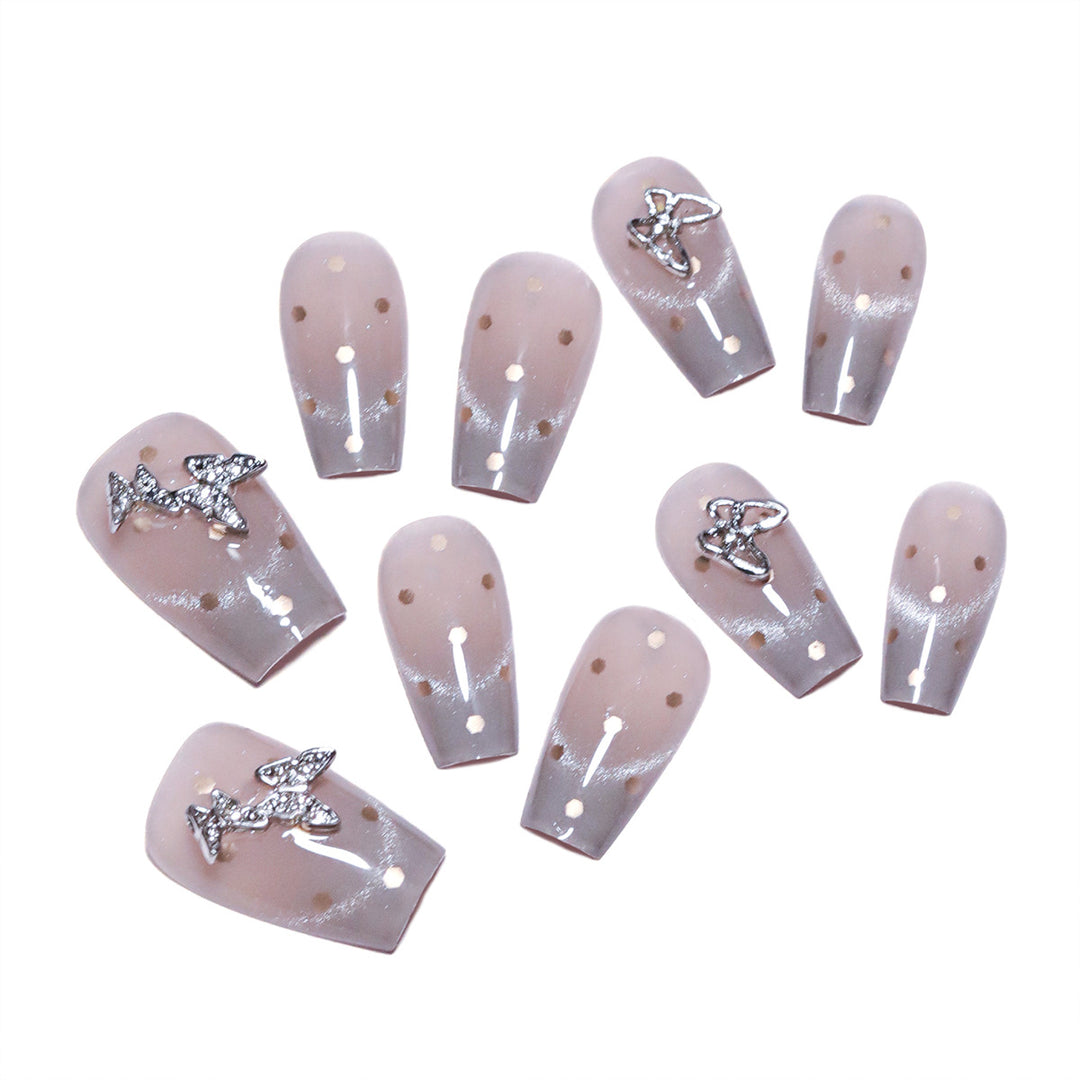 Artificial nail art with glitter details and bow accents Kalsten