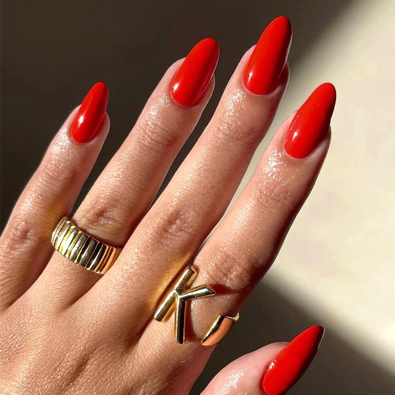 Artful nail designs with a matte finish and elegant stiletto shape Kalsten