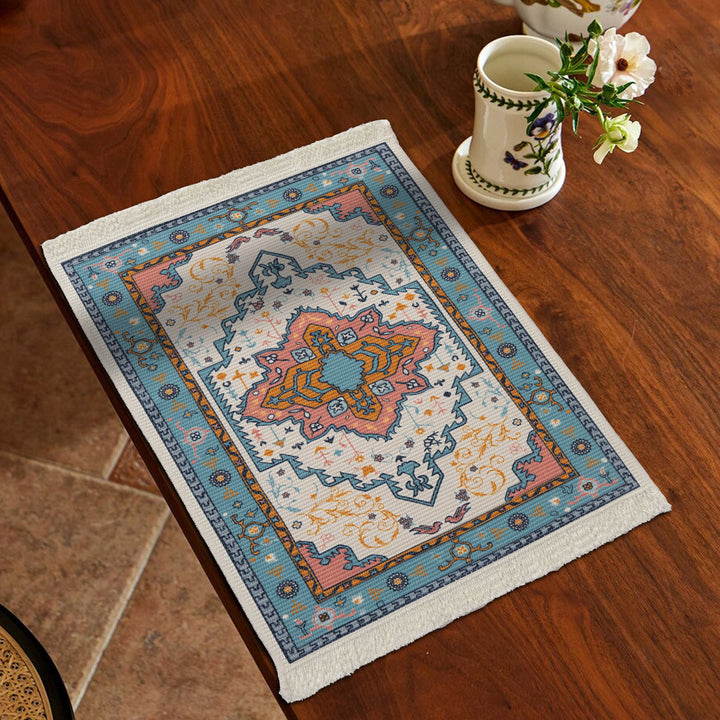 Smaller woven vintage oriental rug with floral medallion design and fringe