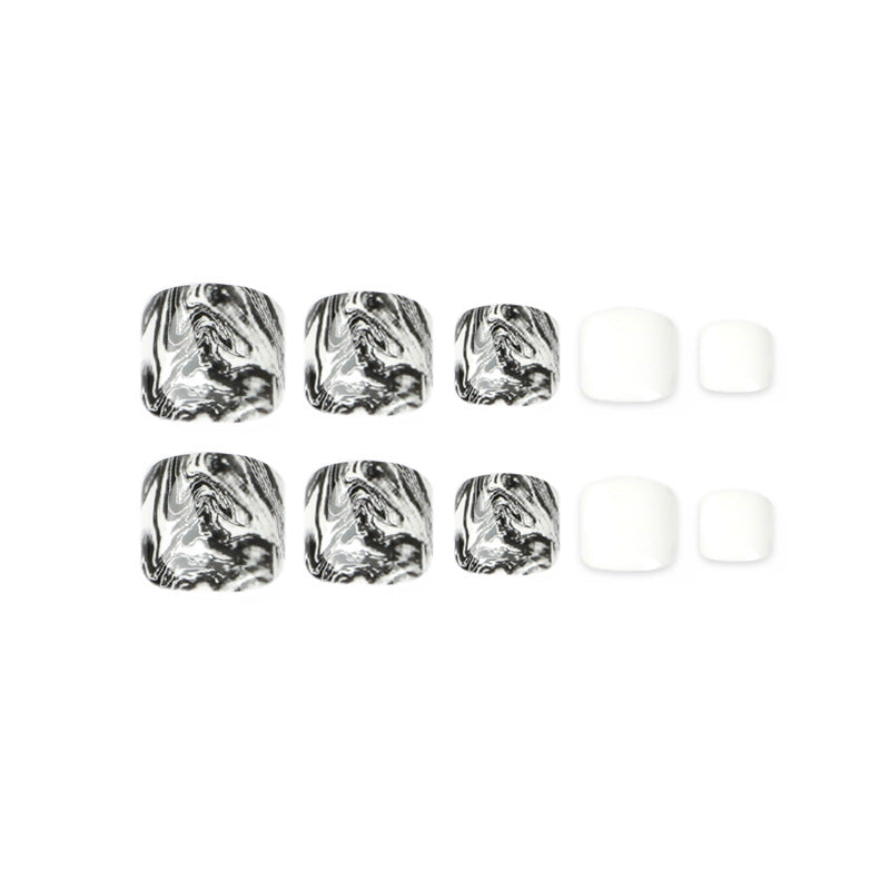 Artful toenail art in elegant marble design Kalsten
