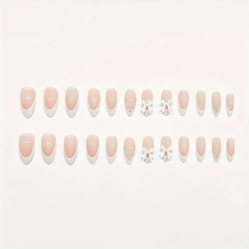 Artistic Press-On Nail Design with Bow Accents Kalsten