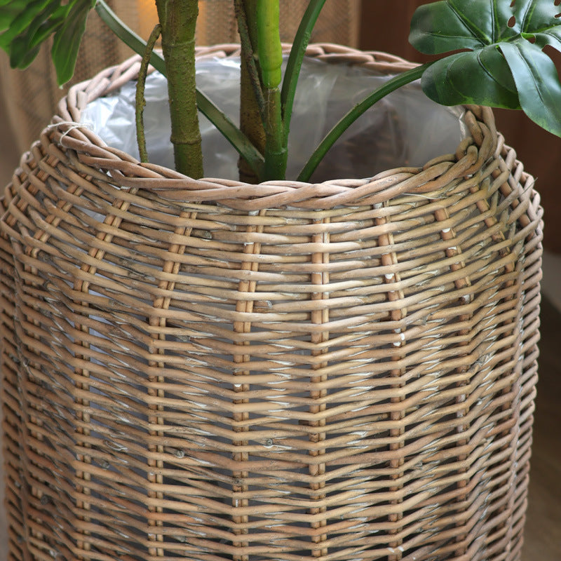 Stylish laundry basket made of braided natural material Kalsten