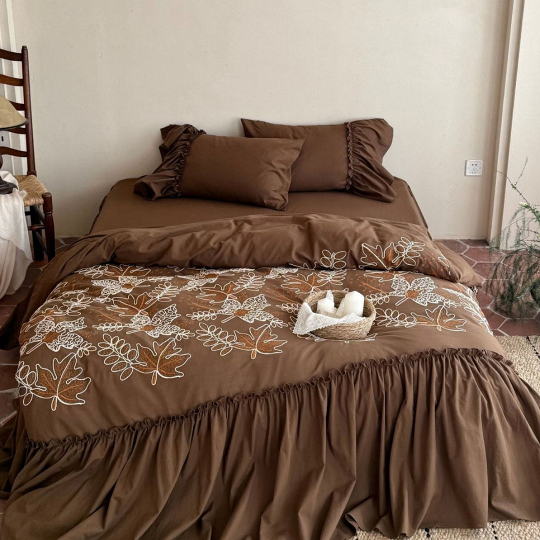 Bedding set with floral embroidered cover, gathered ruffle and cotton texture