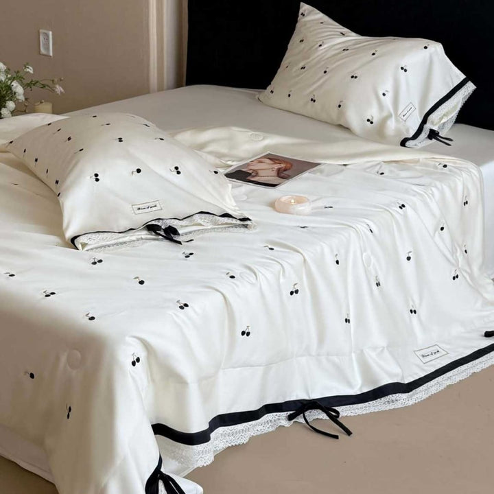Luxurious cotton satin bedding set with cherry print, lace trim and frill