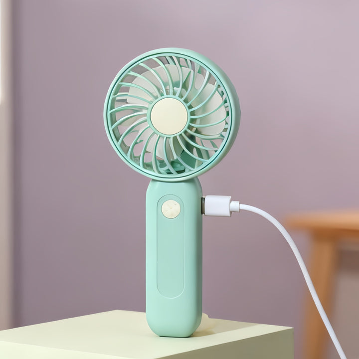 Women's portable battery-operated hand fan with ergonomic design and USB charging Kalsten