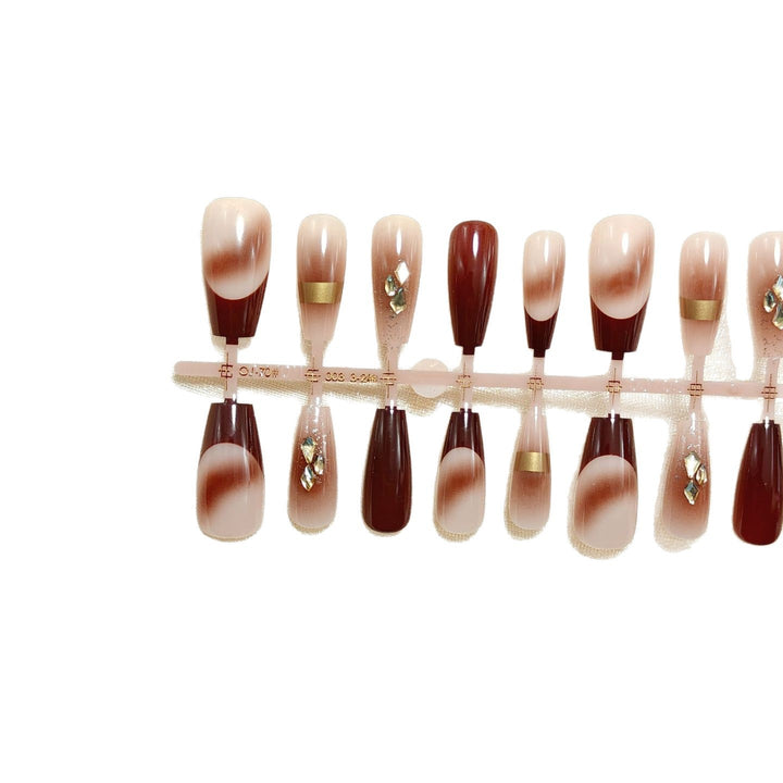 Artificial nails with elegant color gradients and jewelry details Kalsten