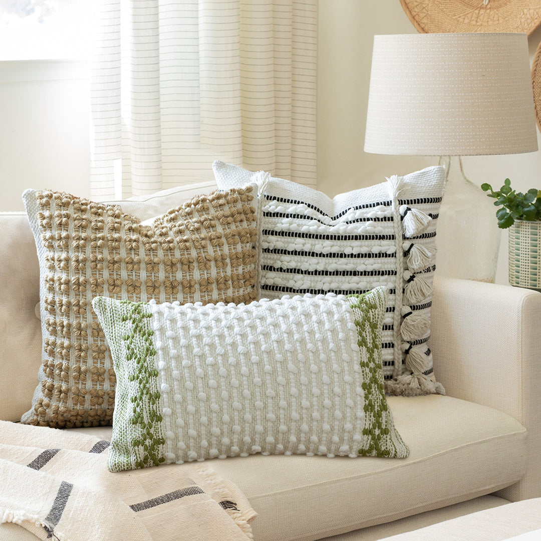 Woven Boho decorative cushion with tassels, tufted relief and handcrafted details